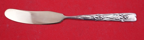 Butter Spreader flat handle from Roslyn Berlin collection pictured in the book 